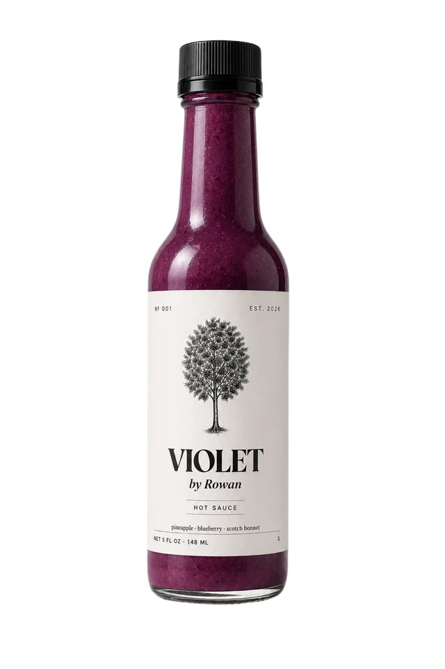 VIOLET by Rowan hot sauce bottle on a white background